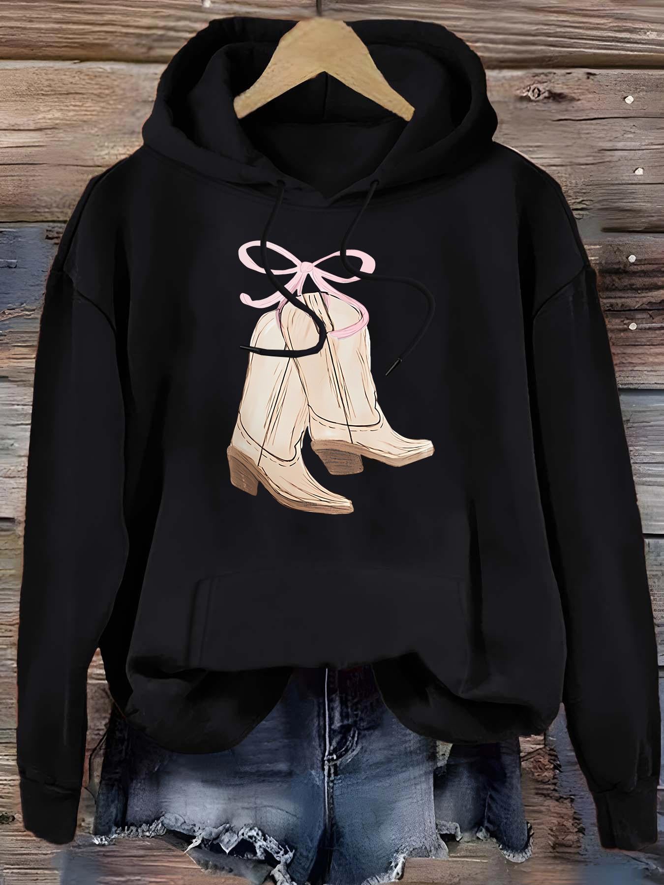 Tailorly Women's Printed Hoodie - Chic Ribbon With Soft Pink Glow Featuring Hanging Cowboy Boots
