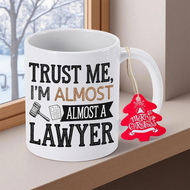 Tailorly White Ceramic 11 oz Mug - Trust Me Im Almost A Lawyer Sleek White Ceramic Vessel Resting On Window Sill Against Snowy Winter Scenery Mug