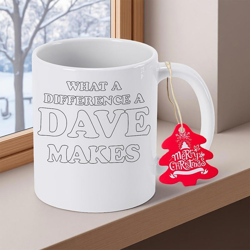 Tailorly White Ceramic 11 oz Mug - What A Difference A Dave Makes Merry Christmas Pure Placed On A Wooden Window Ledge Mug