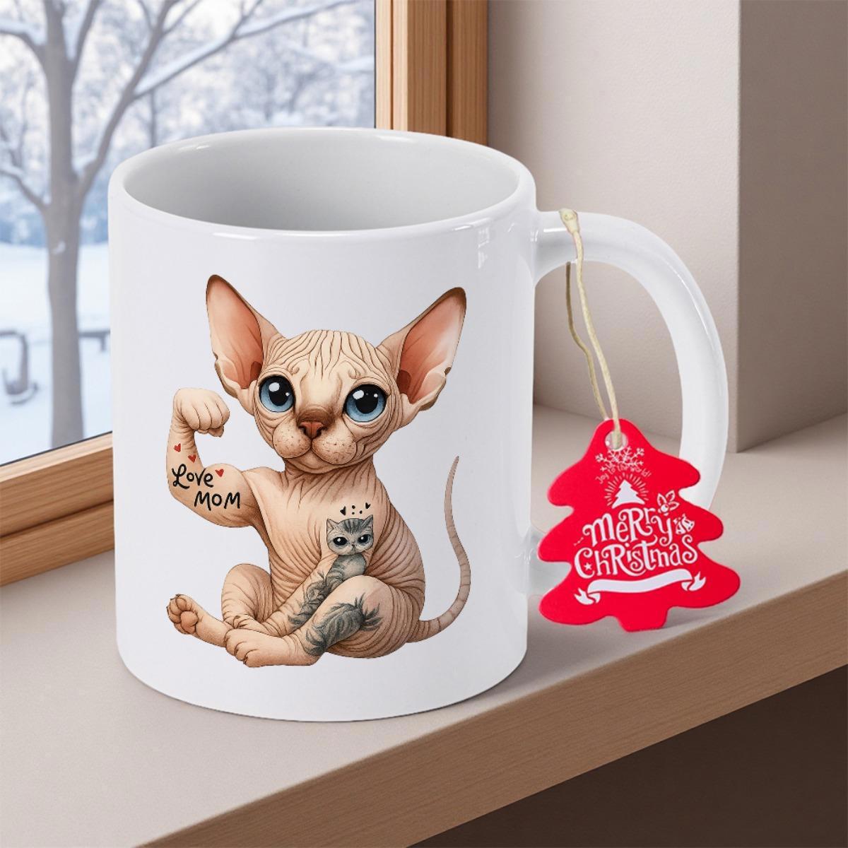 Tailorly White Ceramic 11 oz Mug - Love Mom Merry Christmas Muscular Sphynx Cat With Tattoos Sitting Calmly In Cozy Winter Room Cat