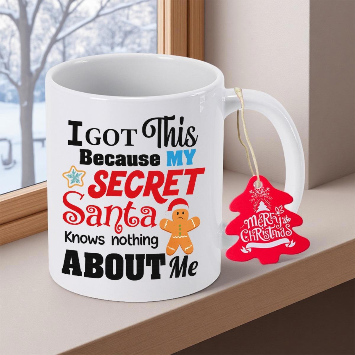 Tailorly White Ceramic 11 oz Mug - I Got This Because My Secret Santa Knows Nothing About Me Festive Gingerbread Man Wearing A Red Hat Amidst Colorful Decorative