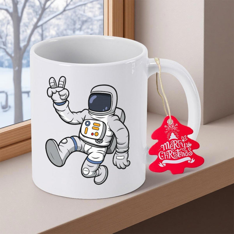 Tailorly White Ceramic 11 oz Mug - Merry Christmas Floating Space Traveler In White Suit Giving Peace Sign Astronaut