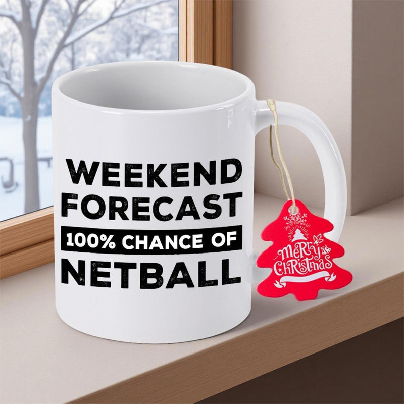 Tailorly White Ceramic 11 oz Mug - Weekend Forecast 100% Chance Of Netball Merry Christmas White Ceramic Coffee Cup Featuring Bold Black Text Standing On Wooden