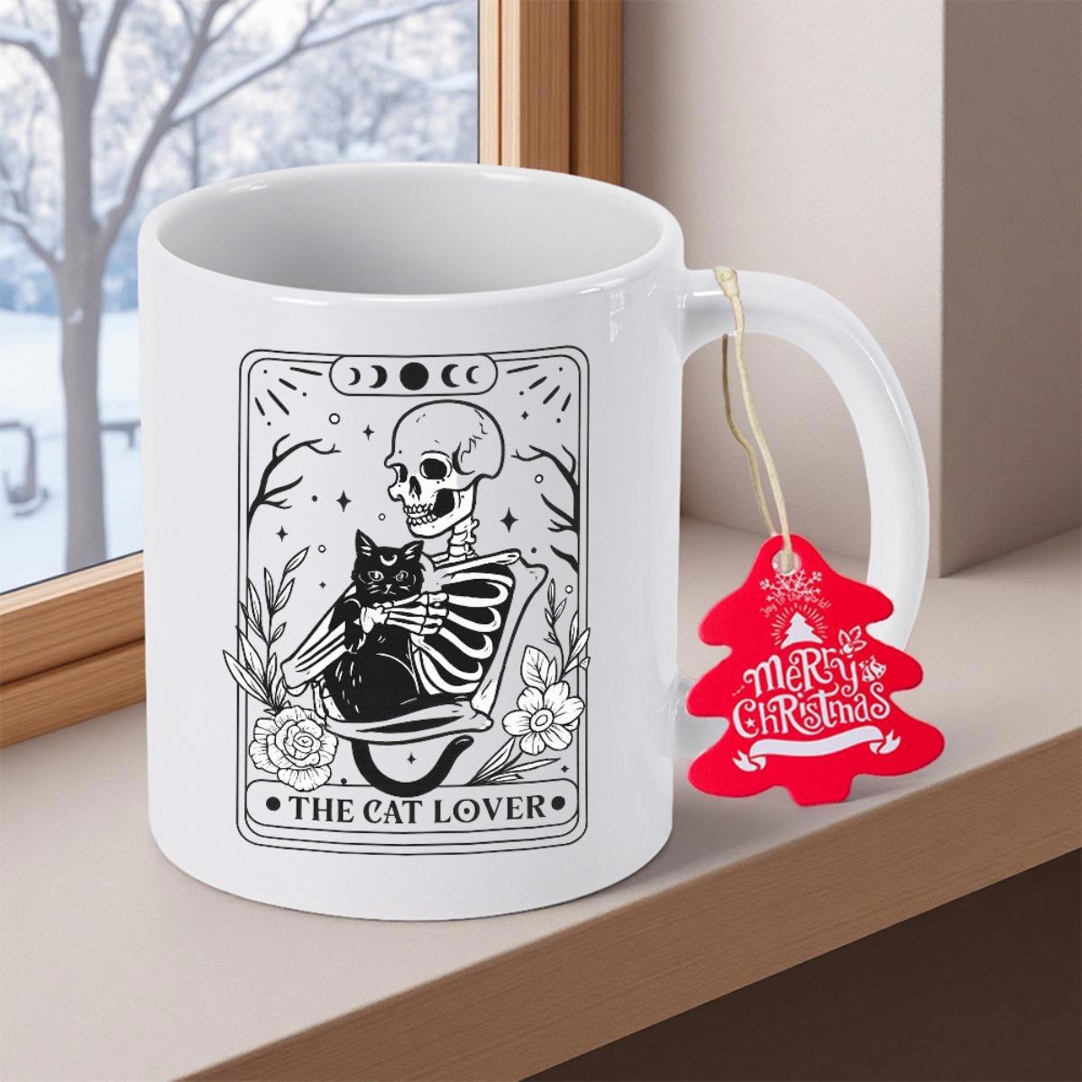 Tailorly White Ceramic 11 oz Mug - The Cat Lover Intricate Black Ink Skeletal Figure Cradling Feline Inside Tarot Style Frame Skeleton