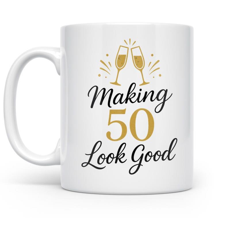 Tailorly White Ceramic 11 oz Mug - Making 50 Look Good Golden Champagne Glasses Clinking With Sparkles For A Birthday Celebration Mug