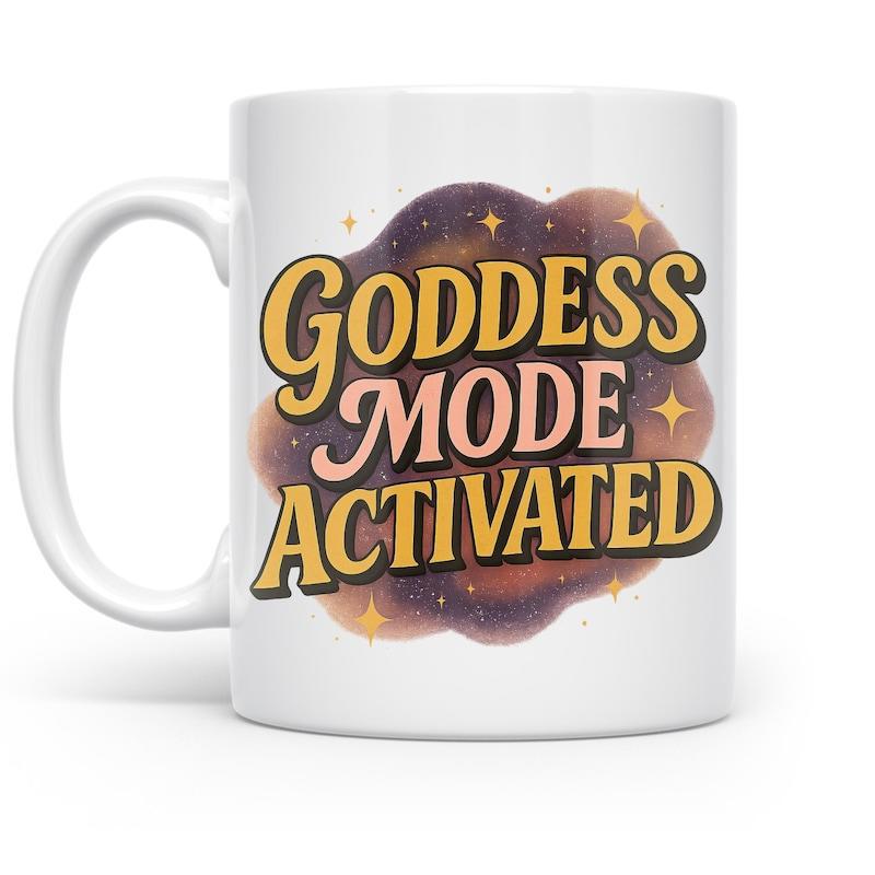 Tailorly White Ceramic 11 oz Mug - Goddess Mode Activated Cosmic Nebula Background With Sparkling Stars Behind Retro Styled Typography Mug