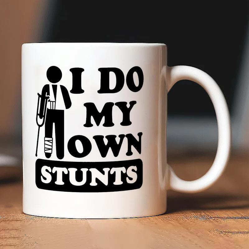 Tailorly White Ceramic 11 oz Mug - I Do My Own Stunts Injured Silhouette With Crutches And Slings Standing Next To Bold Text Figure