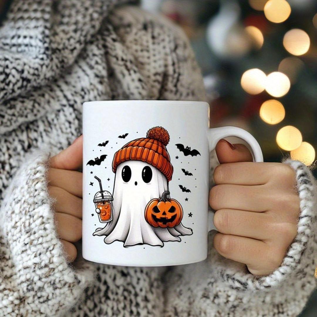 Tailorly White Ceramic 11 oz Mug - Spooky Halloween Spirit Wearing Orange Beanie Holding Pumpkin Among Flying Bats Ghost