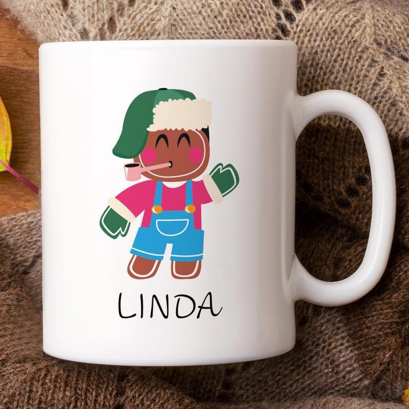 Tailorly White Ceramic 11 oz Mug - Linda Festive Gingerbread Man Wearing Green Trapper Hat And Blue Denim Overalls Gingerbread Man