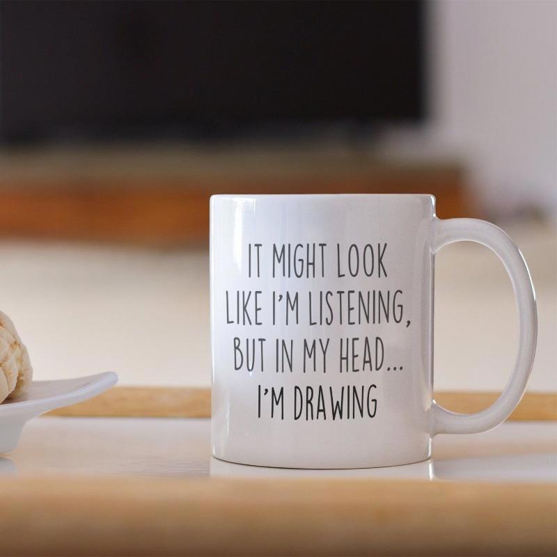 Tailorly White Ceramic 11 oz Mug - It Might Look Like Im Listening But In My Head Im Drawing Sleek Minimalist White Ceramic Texture With Clean Black Typographic