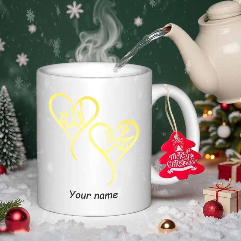 Tailorly White Ceramic 11 oz Mug - Your Name Merry Christmas Two Golden Stylized Hearts Resting On A Clean White Surface Ceramic Mug