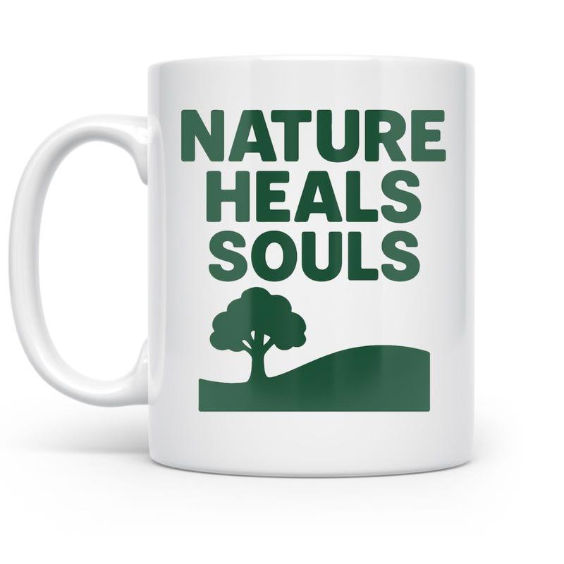 Tailorly White Ceramic 11 oz Mug - Nature Heals Souls Minimalist Green Silhouette Standing On A Peaceful Rolling Hillside Meadow Tree