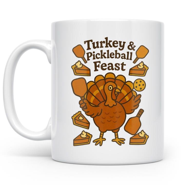 Tailorly White Ceramic 11 oz Mug - Turkey Pickleball Feast Whimsical Cartoon Turkey Holding A Paddle Surrounded By Slices Of Pie Turkey