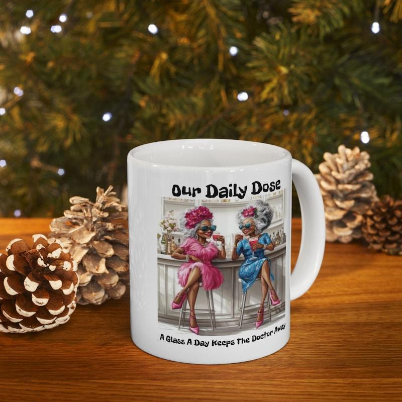 Tailorly White Ceramic 11 oz Mug - Our Daily Dose A Glass A Day Keeps The Doctor Away Two Elegant Ladies Enjoying Wine At A Cozy Bar Counter Atmosphere Mug
