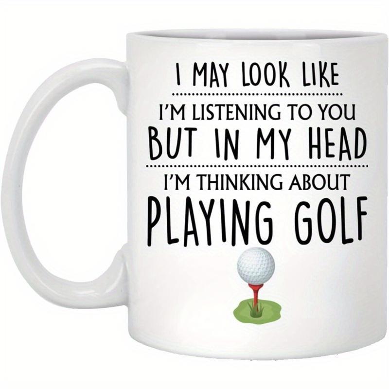 Tailorly White Ceramic 11 oz Mug - I May Look Like Im Listening To You But In My Head Im Thinking About Playing Golf Minimalist White Sphere Resting On Red Tee
