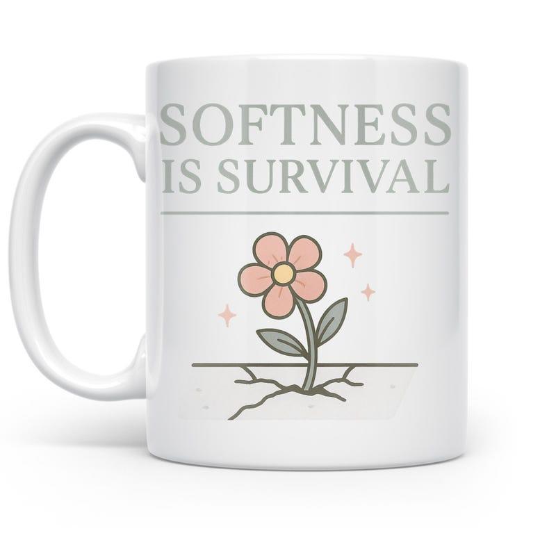 Tailorly White Ceramic 11 oz Mug - Softness Is Survival Simple Pink Flower Growing From Cracked Ground With Green Leaves And Sparkles Flower