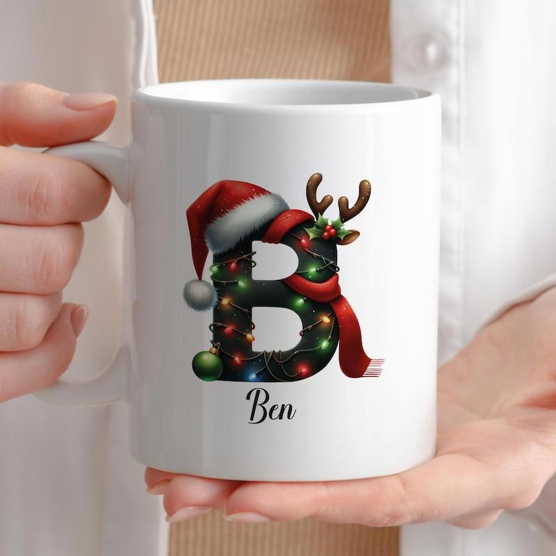 Tailorly White Ceramic 11 oz Mug - Ben Festive Christmas Wreath Style Ornamented With Reindeer Antlers Letter
