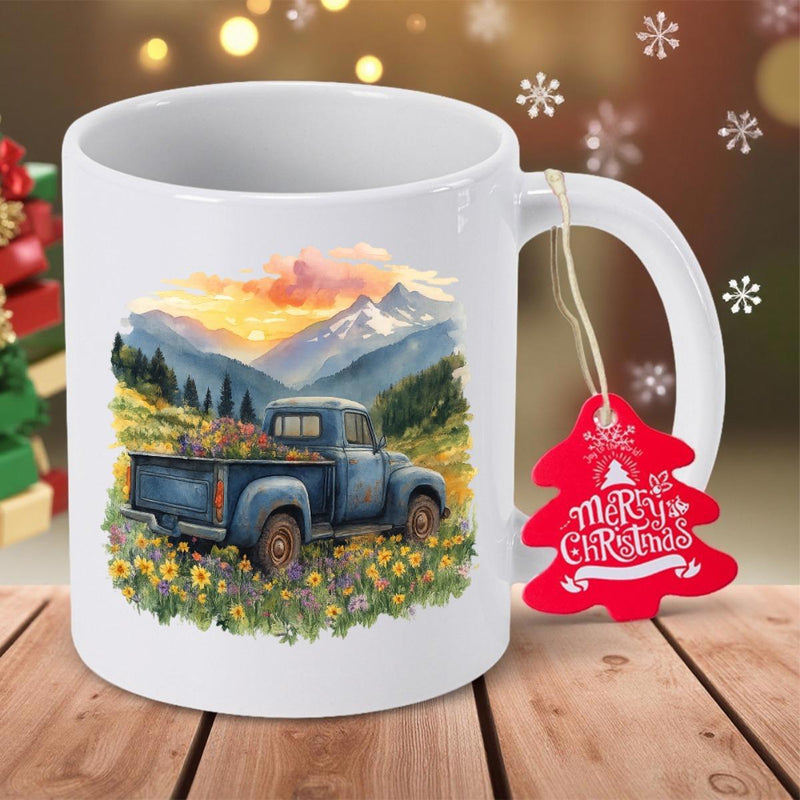 Tailorly White Ceramic 11 oz Mug - Merry Christmas Blue Vintage Pickup Surrounded By Yellow Wildflowers Under Snow Mountains Truck