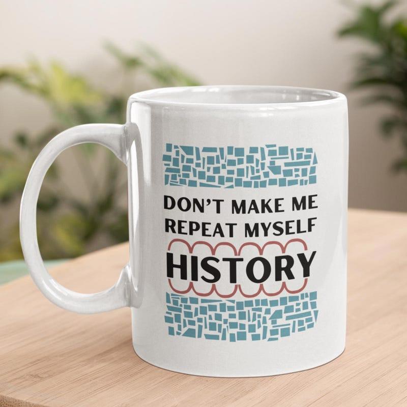 Tailorly White Ceramic 11 oz Mug - Don't Make Me Repeat Myself History Minimalist Style Featuring Blue Geometric Blocks And Bold Black Typography History Slogan