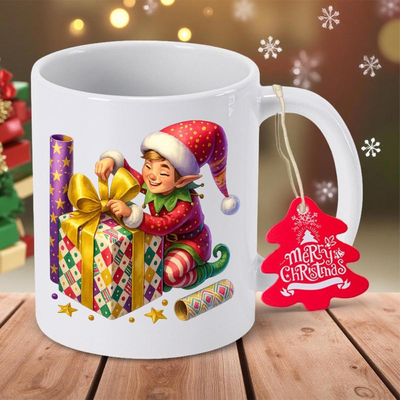 Tailorly White Ceramic 11 oz Mug - Merry Christmas Merry Festive Elf Wrapping A Large Colorful Gift With Bow Ornament Mug