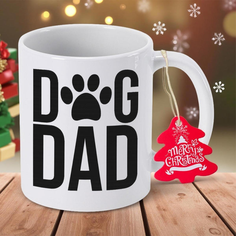 Tailorly White Ceramic 11 oz Mug - Dog Dad Merry Christmas Bold Block Letters Featuring A Stylized Silhouette Animal Paw Print Mug