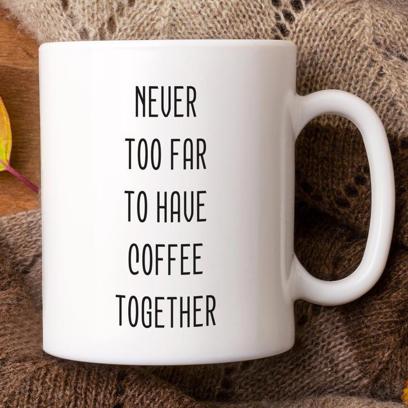 Tailorly White Ceramic 11 oz Mug - Never Too Far To Have Coffee Together Simple Ceramic Vessel Standing On Warm Cozy Knit Fabric Background Mug