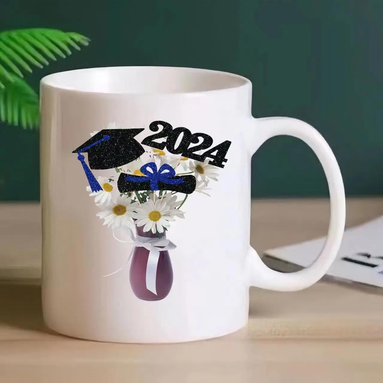 Tailorly White Ceramic 11 oz Mug - 2024 Graduation Mortarboard And Diploma Resting Upon White Daisy Bouquet Vase
