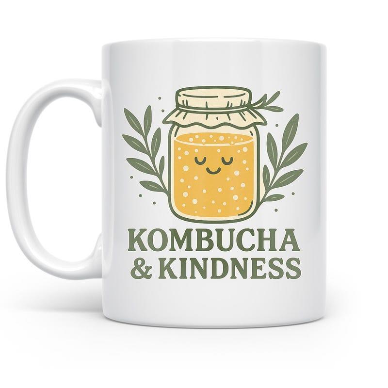 Tailorly White Ceramic 11 oz Mug - Kombucha Kindness Cute Smiling Vessel Filled With Golden Liquid Framed By Leaves Jar