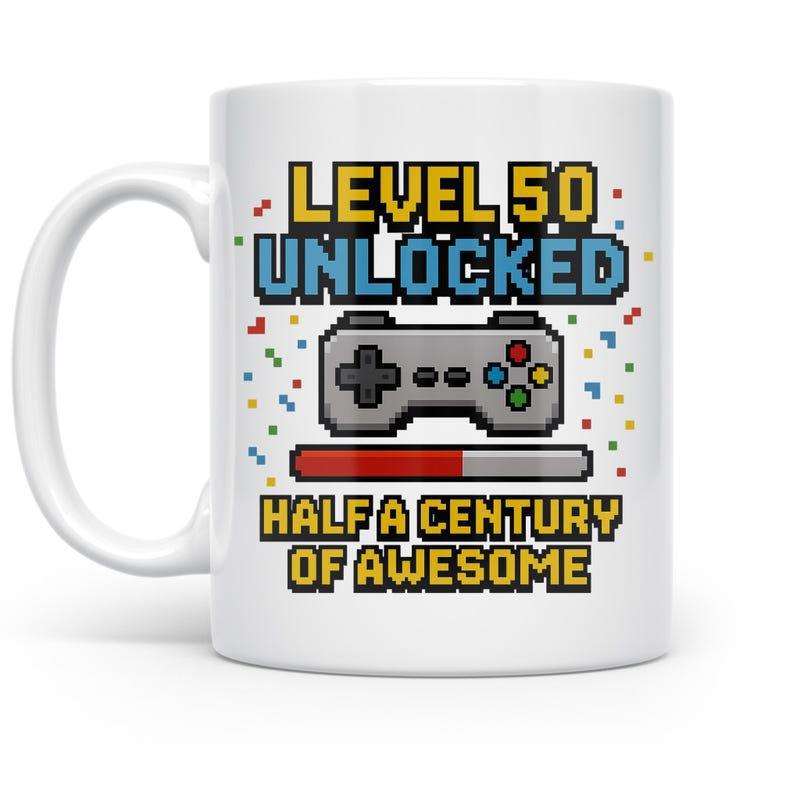 Tailorly White Ceramic 11 oz Mug - Level 50 Unlocked Half A Century Of Awesome Vintage Pixelated Gaming Controller Surrounded By Colorful Pixels And Loading Bar