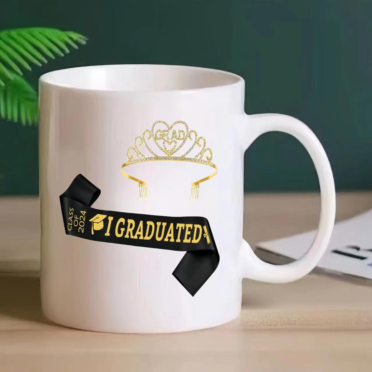 Tailorly White Ceramic 11 oz Mug - I Graduated Golden Tiara Floating Above Black Graduation Sash With Bold Lettering Mug