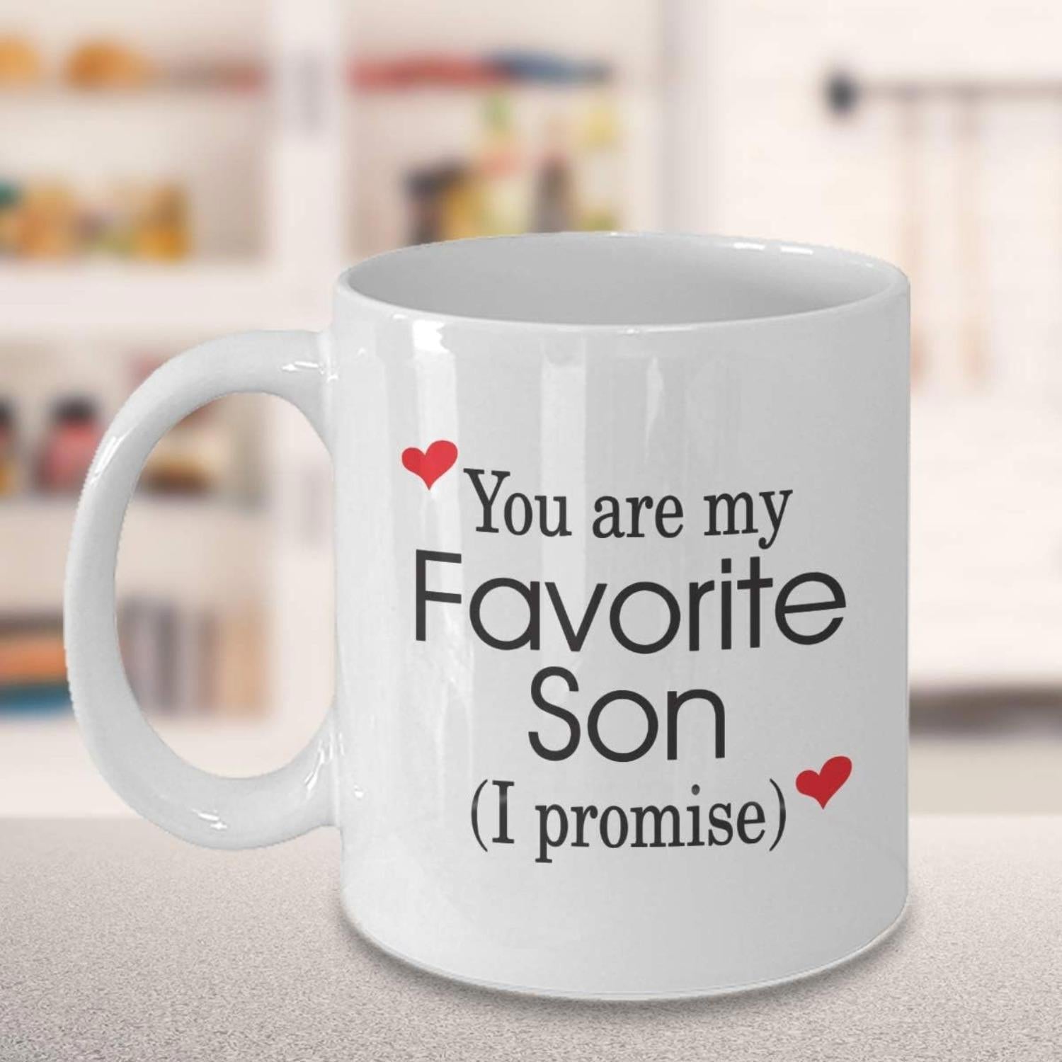 Tailorly White Ceramic 11 oz Mug - You Are My Favorite Son I Promise Minimalist White Ceramic Vessel Decorated With Two Small Heart Accents Mug