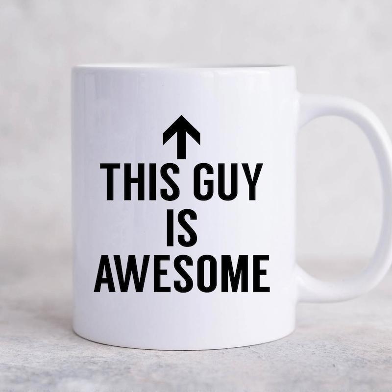 Tailorly White Ceramic 11 oz Mug - This Guy Is Awesome Minimalist White Ceramic With Bold Black Text And Upward Arrow Mug