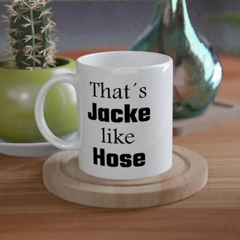Tailorly White Ceramic 11 oz Mug - Thats Jacke Like Hose Simple Elegant White Ceramic Vessel Resting Upon A Natural Wooden Base Mug