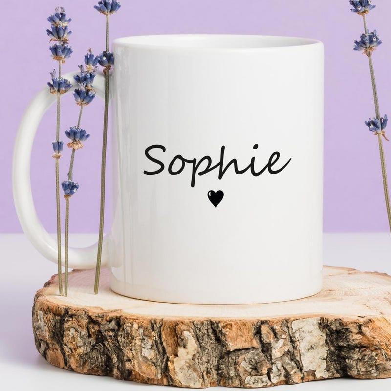 Tailorly White Ceramic 11 oz Mug - Sophie Minimalist Script Text Featuring A Tiny Solid Black Heart Mug