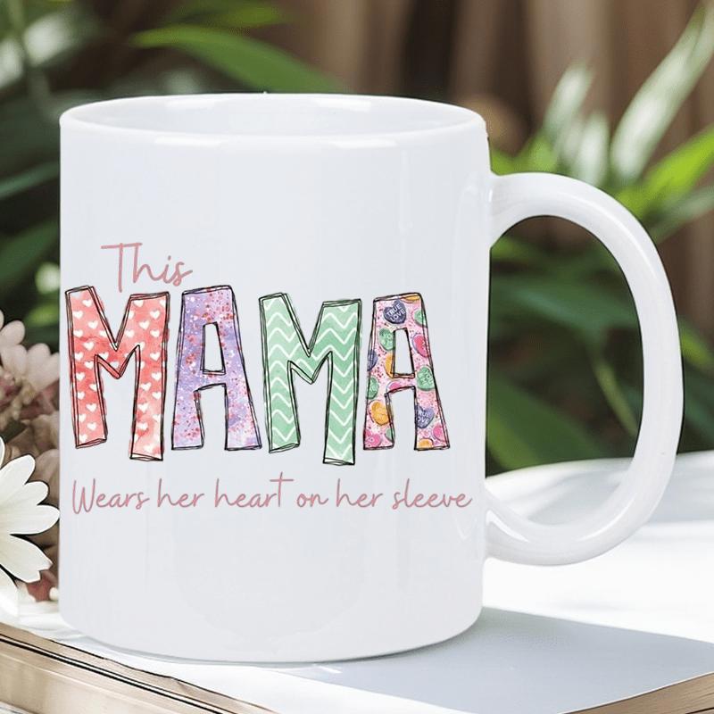 Tailorly White Ceramic 11 oz Mug - This Mama Wears Her Heart On Her Sleeve Vibrant Decorative Patterns Inside Bold Block Letters With Floral Accents Mama