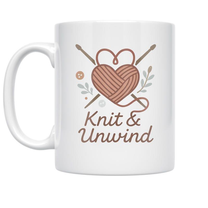 Tailorly White Ceramic 11 oz Mug - Knit Unwind Cozy Heart Shaped Yarn Ball With Crossed Knitting Needles And Leaves Yarn