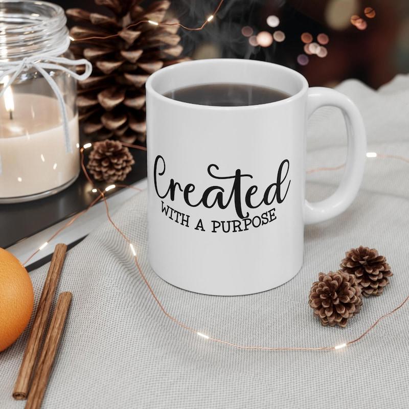 Tailorly White Ceramic 11 oz Mug - Created With A Purpose Classic White Ceramic Drinkware Resting Peacefully On A Warm Cozy Table Mug