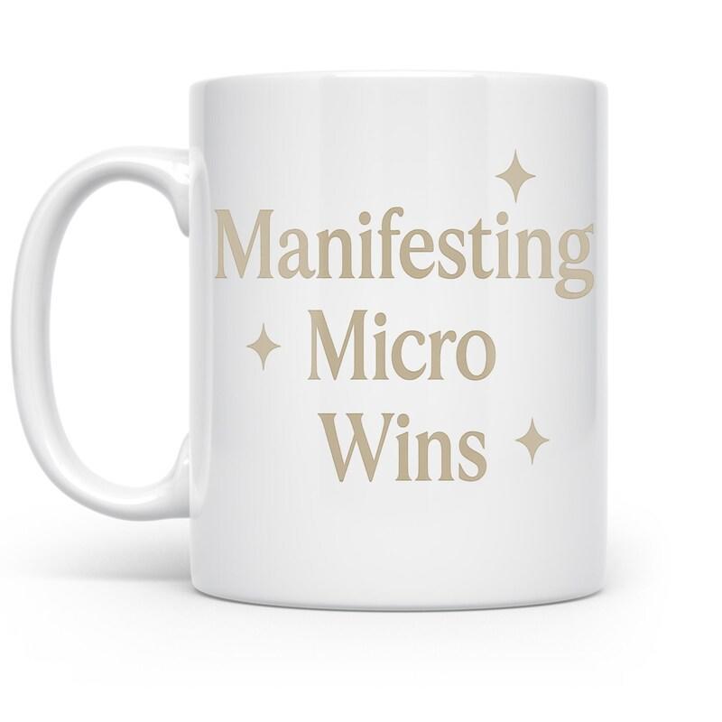 Tailorly White Ceramic 11 oz Mug - Manifesting Micro Wins Elegant Beige Sparkles Scattered Around Centered Minimalist Motivational Typography Mug