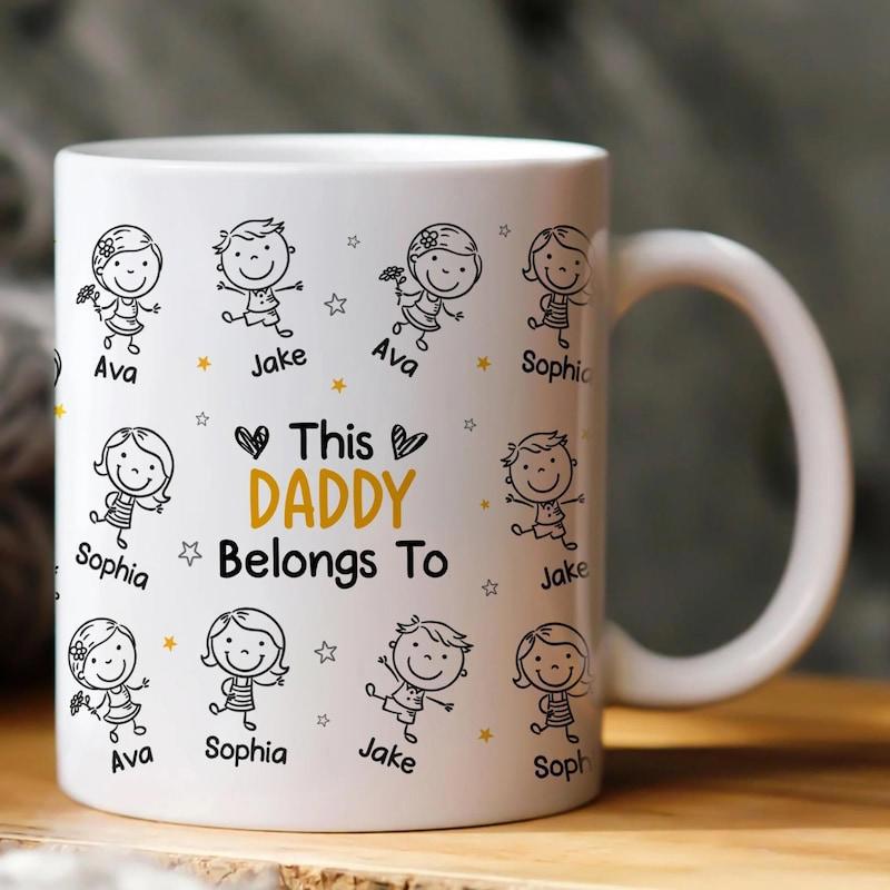 Tailorly White Ceramic 11 oz Mug - This Daddy Belongs To Ava Jake Sophia Playful Hand Drawn Cartoon Children Doodles Among Tiny Stars And Hearts Mug