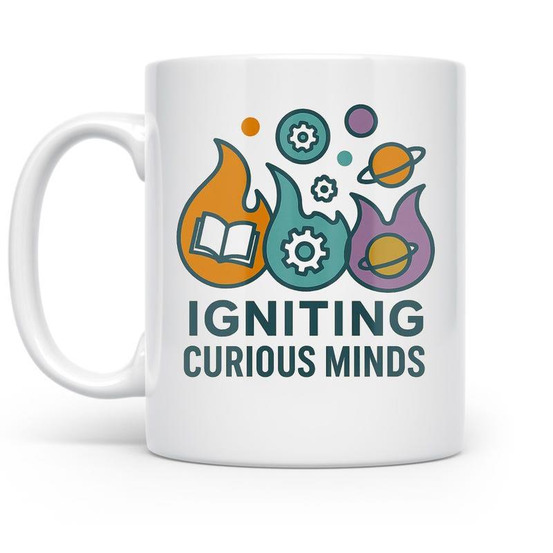 Tailorly White Ceramic 11 oz Mug - Igniting Curious Minds Colorful Educational Flames With Books Gears And Planets Flame