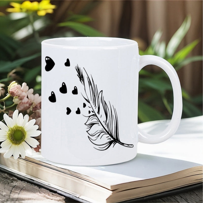 Tailorly White Ceramic 11 oz Mug - Delicate Black Ink Artistic Design With Small Hearts Floating Near Feather