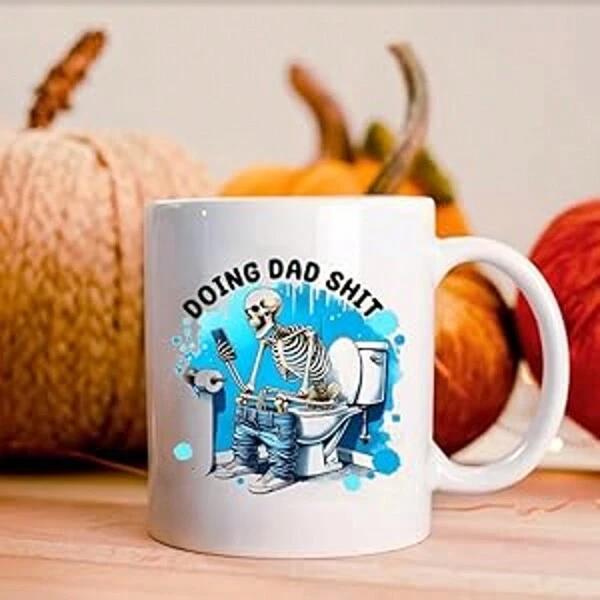 Tailorly White Ceramic 11 oz Mug - Doing Dad Shit Humorous Skeleton Sitting On Toilet With Phone And Blue Splashes Skeleton
