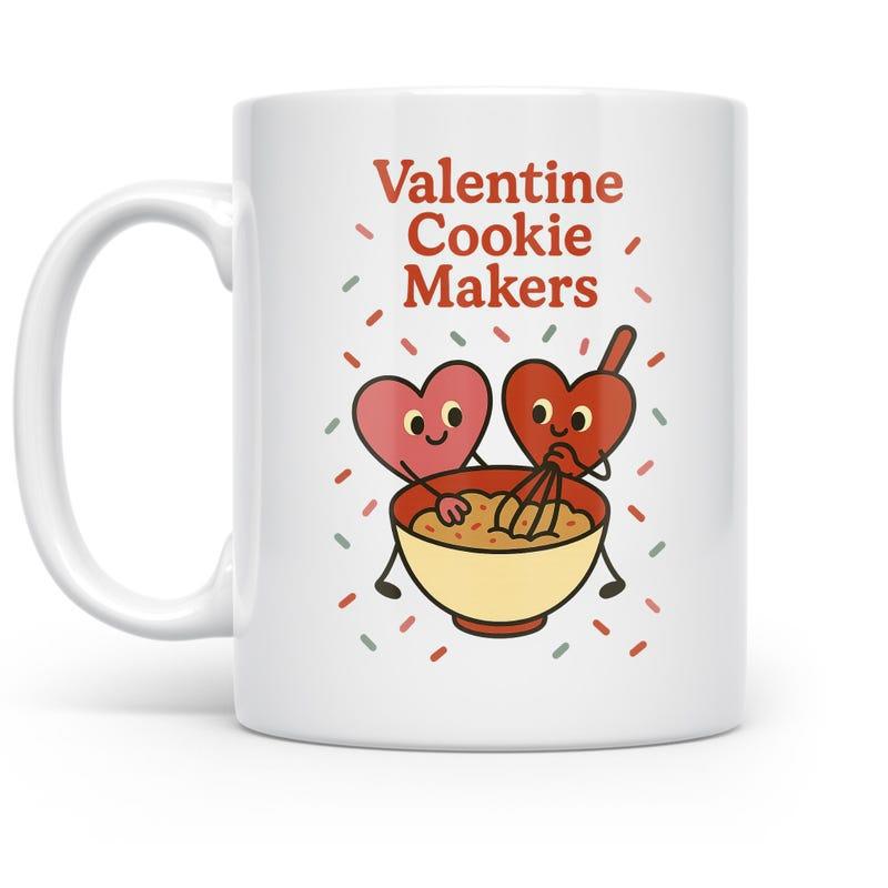 Tailorly White Ceramic 11 oz Mug - Valentine Cookie Makers Two Smiling Hearts Baking Inside A Mixing Bowl With Sprinkles Heart