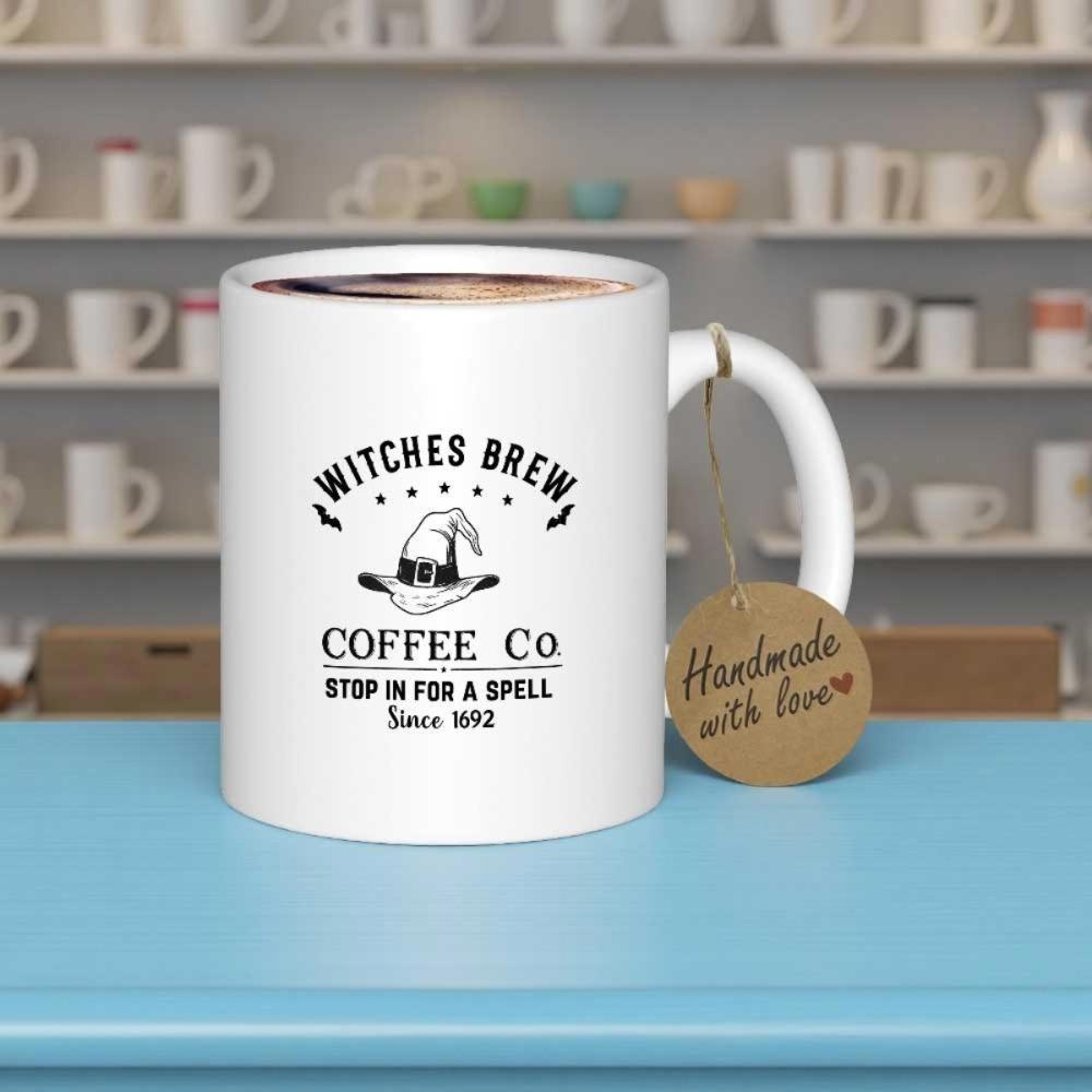 Tailorly White Ceramic 11 oz Mug - Witches Brew Coffee Co Stop In For A Spell Since 1692 Classic Pointed Witch Hat With Flying Bats And Decorative Stars Logo Witch