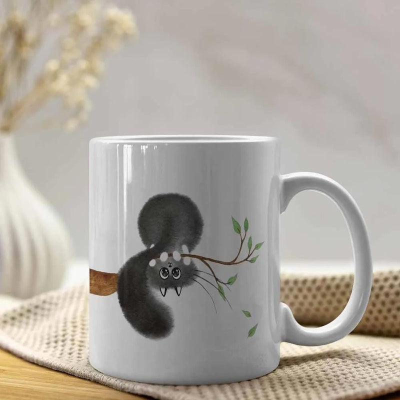 Tailorly White Ceramic 11 oz Mug - Hand Drawn Fluffy Black Hanging From A Tiny Green Branch Cat