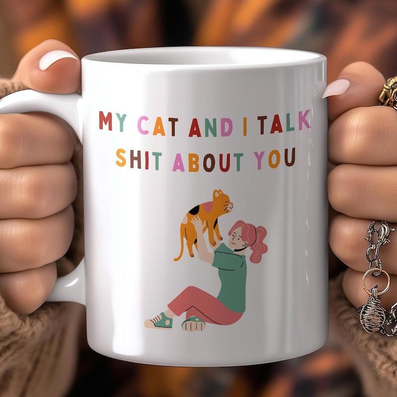 Tailorly White Ceramic 11 oz Mug - My Cat And I Talk Shit About You A Girl Lifting Her Small Spotted Pet Friend Cat