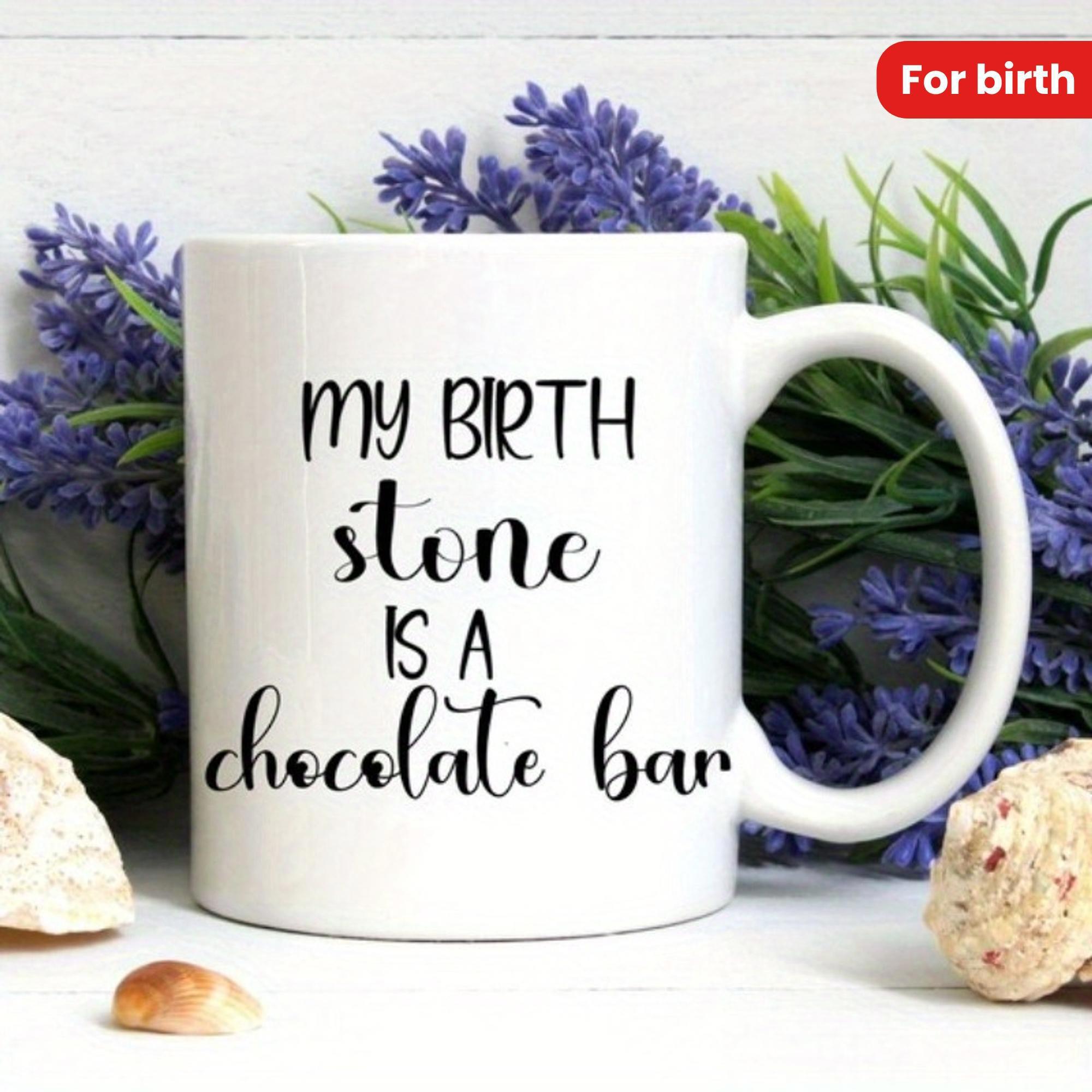 Tailorly White Ceramic 11 oz Mug - My Birth Stone Is A Chocolate Bar Minimalist White Ceramic Kitchenware Sitting Near Purple Lavender And Seashells Mug