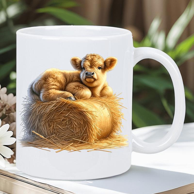 Tailorly White Ceramic 11 oz Mug - Adorable Fluffy Highland Calf Resting Comfortably Atop A Golden Straw Bale Cow