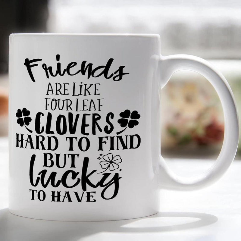 Tailorly White Ceramic 11 oz Mug - Friends Are Like Four Leaf Clovers Hard To Find But Lucky To Have Artistic Hand Written Script Text Surrounded By Minimalist
