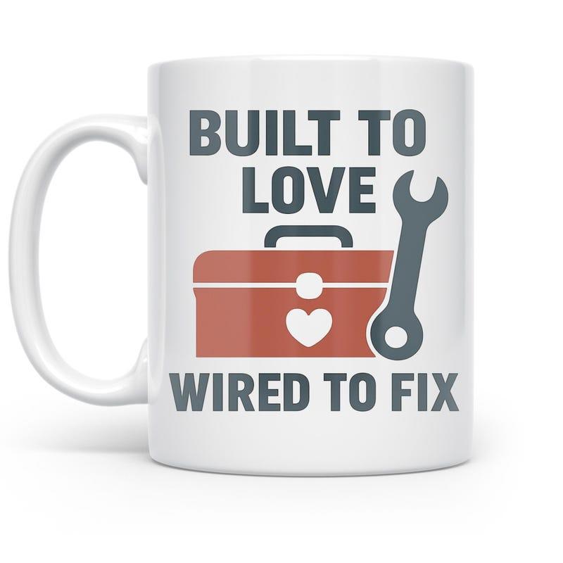 Tailorly White Ceramic 11 oz Mug - Built To Love Wired To Fix Red Toolbox Featuring Heart Detail Alongside Large Mechanic Wrench Toolbox